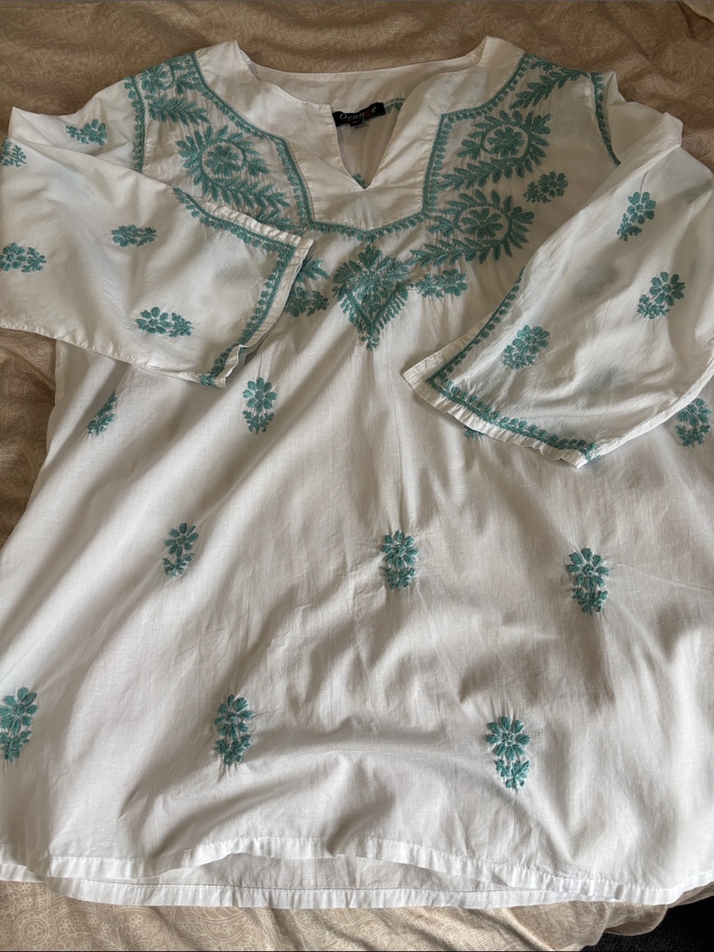 Orange Fashion White Embroidered V-Neck Women's Top with Teal Floral Accents